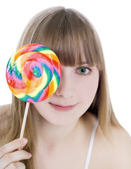 Bright picture of happy blonde with color lollipop