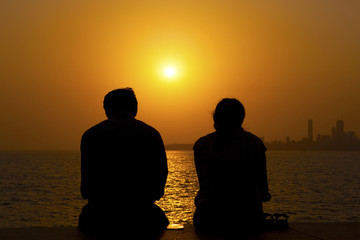 Silhouette of a couple at sunset.