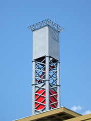 industrial metal construction on blue sky, silver pilone