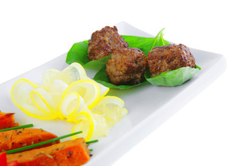 meatballs with tomatoes and lemon