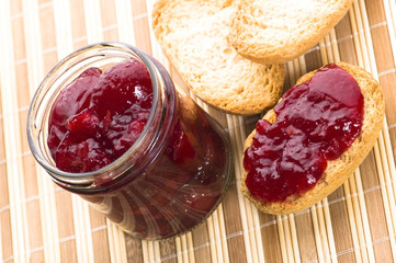 Breakfast of cherry jam on toast