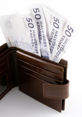 brown wallet with danish kroner
