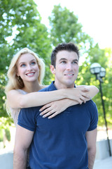Fototapeta premium Attractive Couple in Love (Focus on Man)