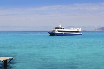 Fototapeta na wymiar Illetas turquoise sea Formentera boat