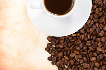 white ceramic cup full of coffee