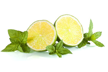 halves of limes on mint leaves