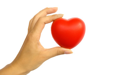 Red heart in woman's hand