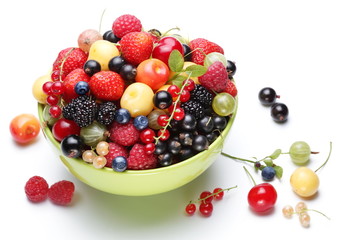 Summer treasure. Different berries in the bowl.
