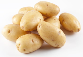 Yellow potatoes on a white background