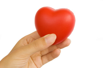 Obraz premium Red heart in woman's hand