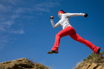 jumping sporty woman