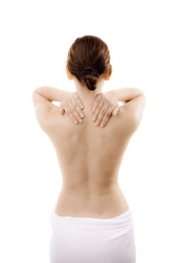 Naklejka premium Woman massaging pain back isolated on white