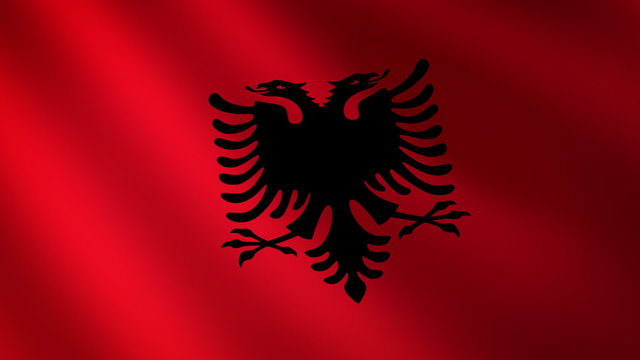 Bandera de Albania ondulante al viento. Bucle continuo