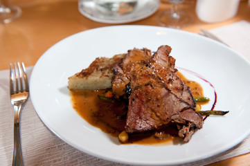 glazed duck breast with cream sauce and fresh vegetable