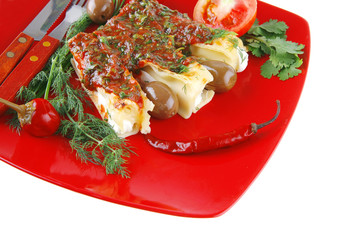 cannelloni served with pepper and tomato