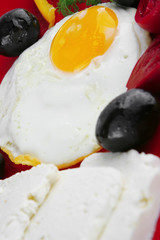 fried egg on red dish