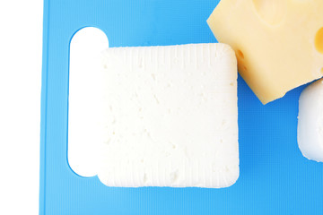 cheeses on blue plate