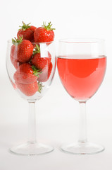 strawberries and wine in glasses