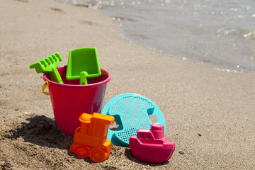 Fototapeta na wymiar colorful plastic beach toys