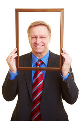 Manager hinter Rahmen
