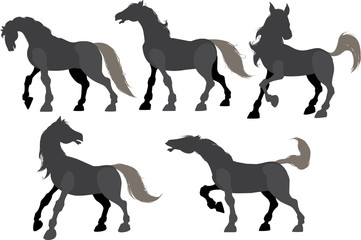 Naklejka premium Five silhouette frolicking horses isolated on white