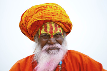 Portrait of a old Sadhu at the ghats in Varanasi, India.