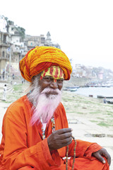Portrait of a old Sadhu at the ghats in Varanasi, India.