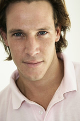 Fototapeta premium Portrait of young male looking to camera