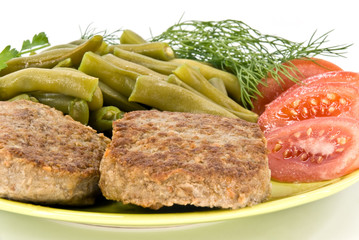 meat rissoles and vegetables