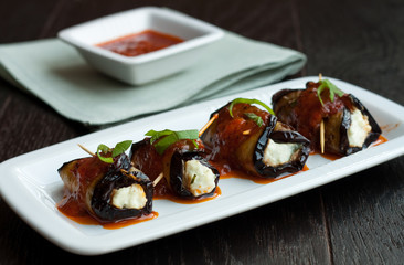 Eggplant rolls stuffed with cottage cheese