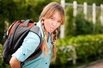 Naklejka premium beautiful young student girl
