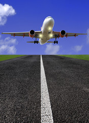 Airplane above runway