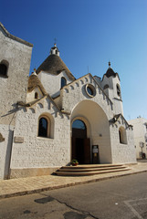 Fototapeta na wymiar Kościół San Antonio - Alberobello Puglia
