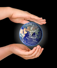 Hand with planet earth