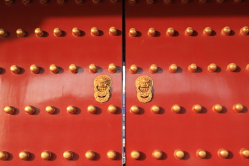 oriental design of red door of Forbidden City