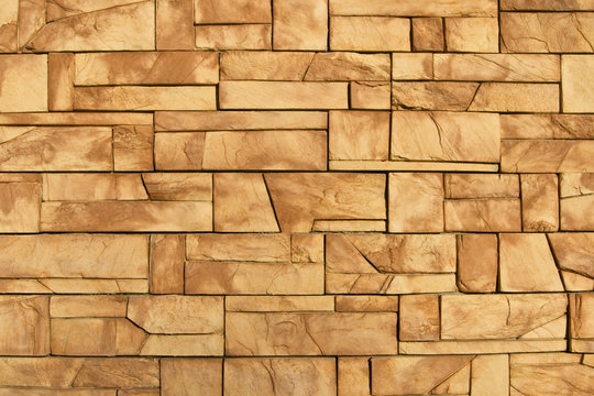 The rock wall in sunset beams