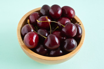 Cherries in a wooden bowl