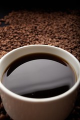 coffee beans with white cup