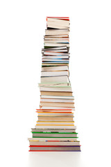 Pile of books on white background