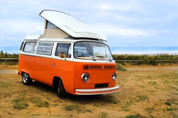 Orange bus on the coast