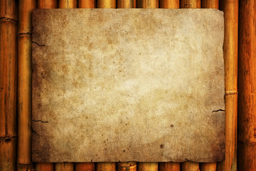 grunge paper on bamboo background