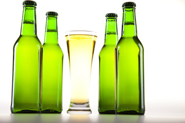 Glass of beer on a white background