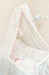 Fototapeta na wymiar Newborn child in a bed