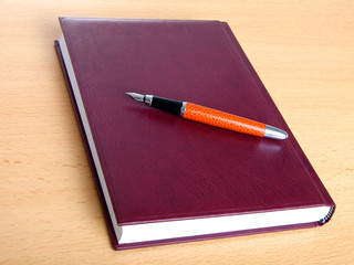 Notebook and pen