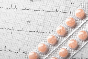 pills on the cardiogram