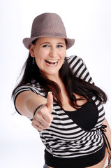 Atractive brunette woman with hat in striped T-shirt