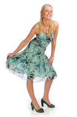 Atractive blonde woman in blue patterned dress