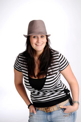 Atractive brunette woman with hat in striped T-shirt