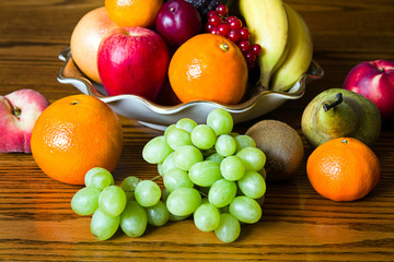 Bowl with fresh, natural looking fruit in close up