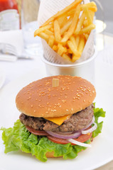 American cheese burger with fresh salad